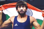 Bajrang Punia at Madison Square Guarden, new york Madison Square Guarden, indian wrestler bajrang punia appeals indians to support him at madison square garden, Madison square garden
