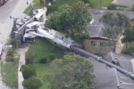 Crane collapse on many homes, many homes affected by care collapse, crane collapses on to several homes in florida, Crumbled Crane collapse on many homes, many homes affected by care collapse, crane collapses on to several homes in florida, Crumbled