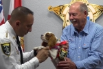 dog, rescue, dog attacked and rescued from alligator honored as deputy dog, Deputy dog