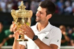 Wimbledon title winner, Novak Djokovic wins Wimbledon, novak djokovic beats roger federer to win fifth wimbledon title in longest ever final, Novak djokovic