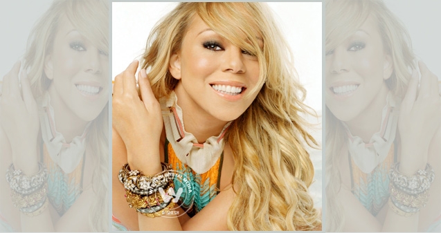 Mariah Carey rolls on to top again!},{Mariah Carey rolls on to top again!