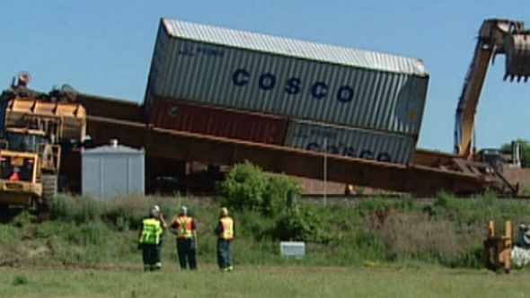 Rice wagons jump off track, derail traffic